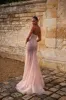 Entrance-worthy semi-transparent rose gold maxi sequined dress sold by Milla