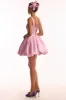 Adorable pink mini dress with puffy skirt, Glow-Up sold by Milla