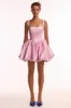 Adorable pink mini dress with puffy skirt, Glow-Up sold by Milla