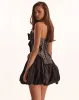 Black lace over the white mesh peplum corset with an oversized bow, Parisienne sold by Milla