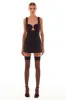 Glossy ultra mini dress in black with cutouts sold by Milla