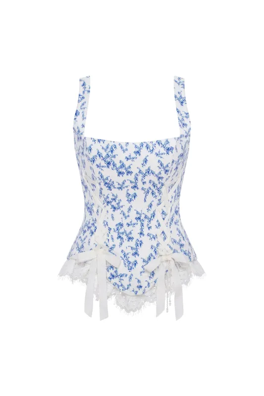 Blue lavender corset on straps with bows and ribbon lacing sold by Milla