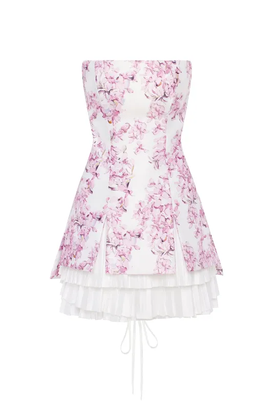 Strapless pink sakura mini dress with accent lacing sold by Milla