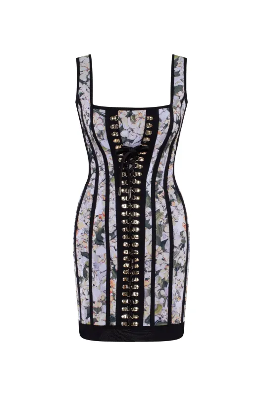 Alluring floral mini dress with bold lace-up hook closure sold by Milla