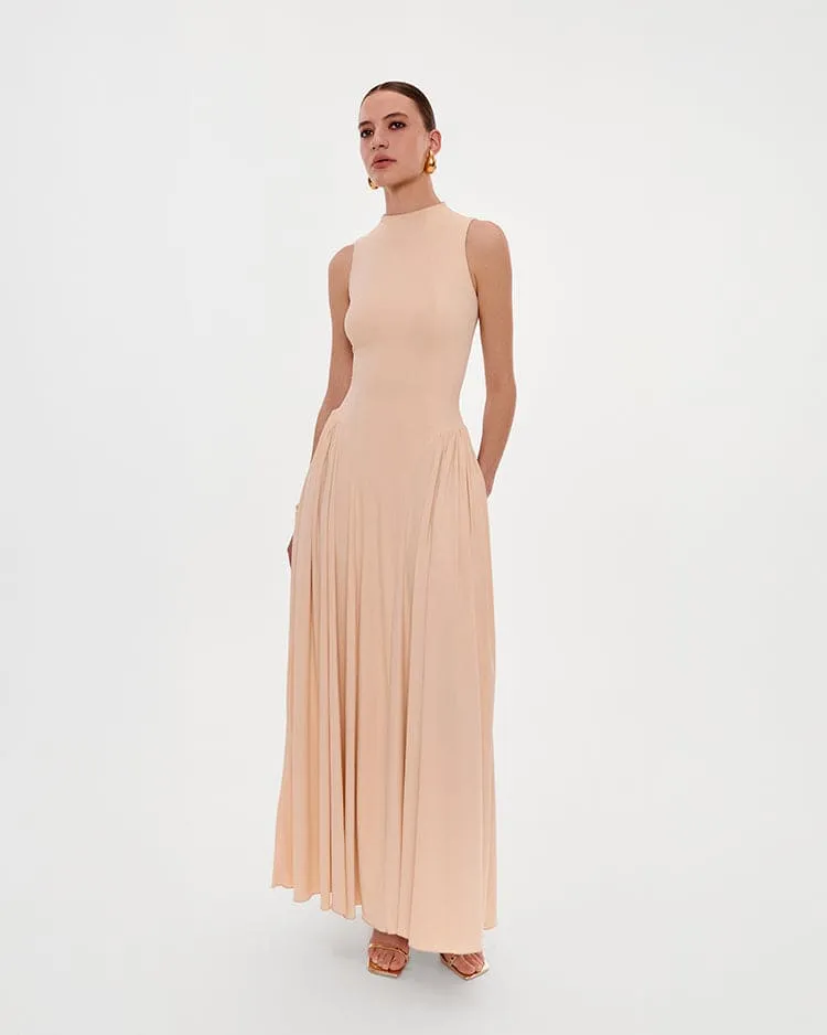 Nude sleeveless mock neck dress with a pleated maxi skirt sold by Milla product image thumbnail 2