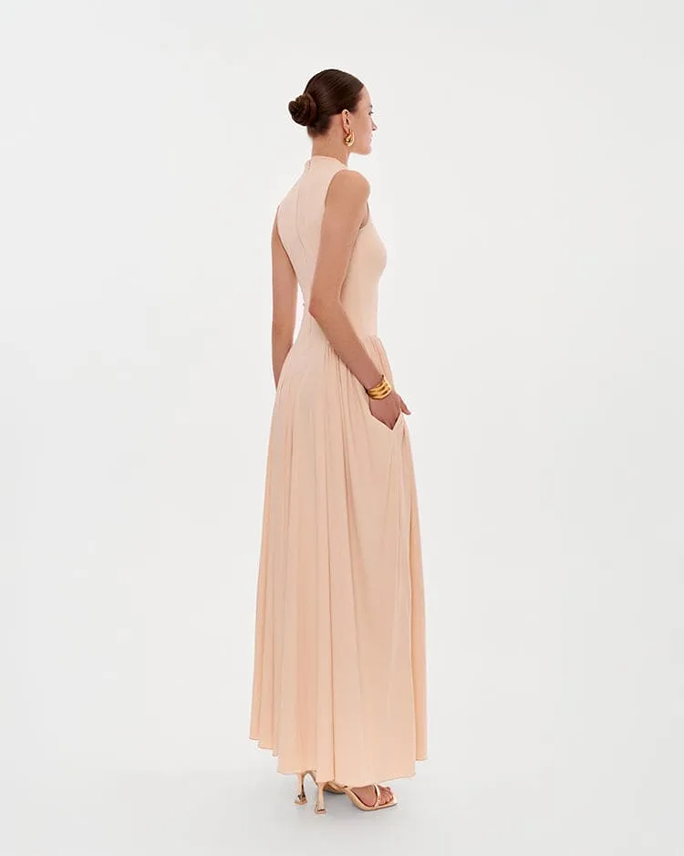 Nude sleeveless mock neck dress with a pleated maxi skirt sold by Milla product image thumbnail 4
