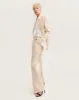 Sparkling beige trousers with Milla's signature, Xo Xo sold by Milla