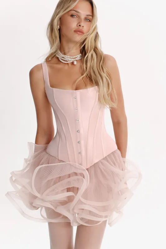 Sculpting pink low-waist corset sold by Milla