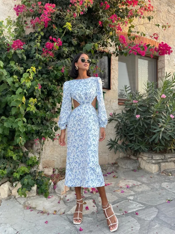 Long-sleeved dress with side cutouts sold by Milla