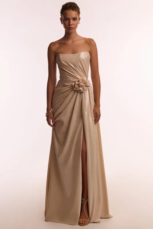 Dazzling sequinned maxi dress in nude with flower detail sold by Milla