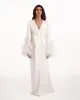 Delicate feather-trimmed satin robe sold by Milla