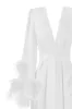 Delicate feather-trimmed satin robe sold by Milla