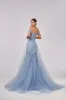 Long off-the-shoulder prom dress with inner skirt sold by Milla