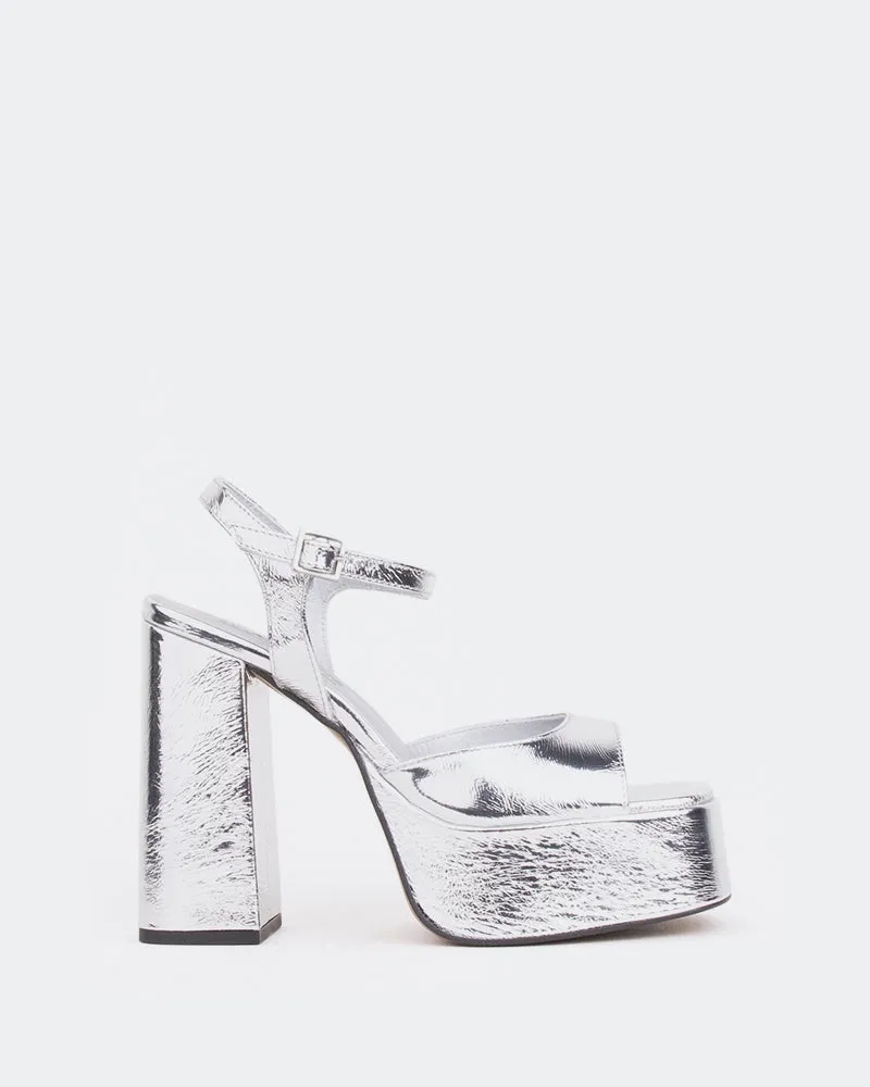 Times Silver Metal/Mètal Argenté sold by L'Intervalle