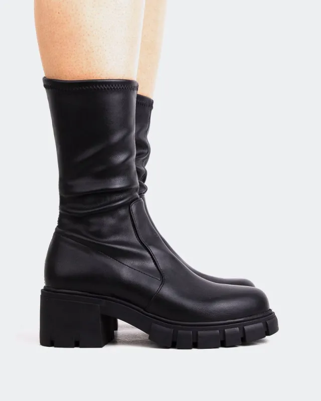 Otley Black Stretch sold by L'Intervalle