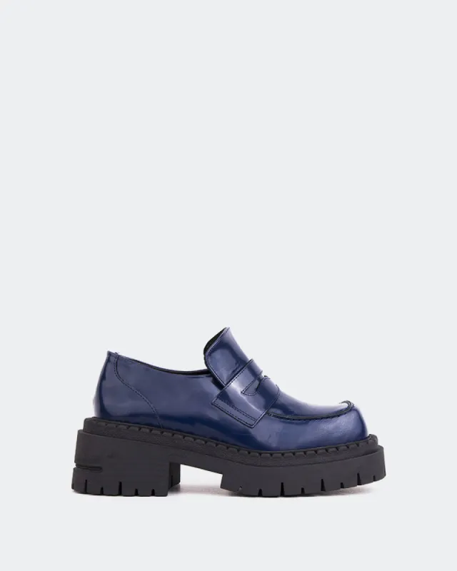 Zolian Navy Leather sold by L'Intervalle