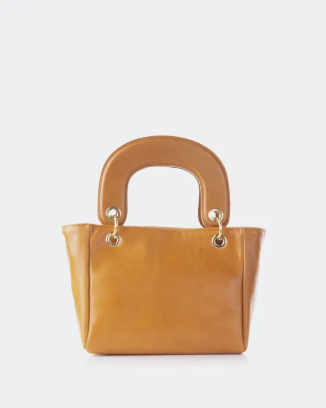 Port Tan Leather sold by L'Intervalle