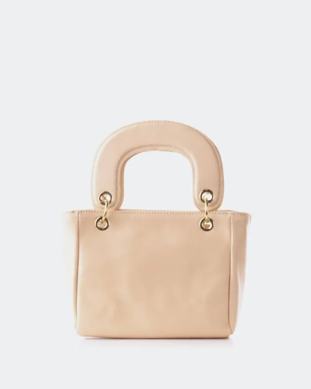 Port Almond Leather sold by L'Intervalle