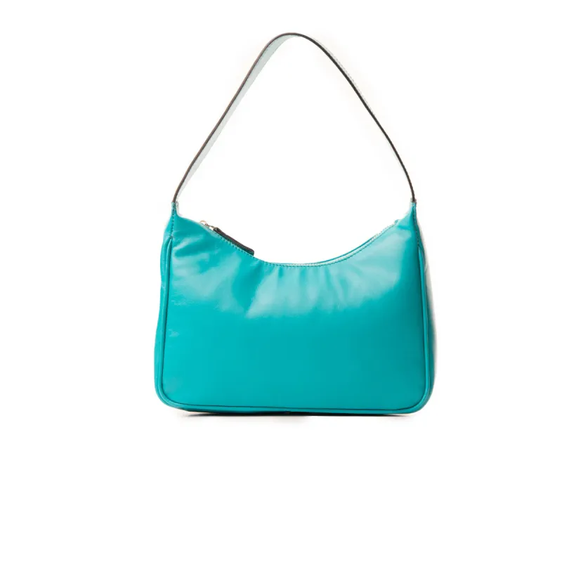 City Teal Leather sold by L'Intervalle