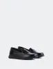 Sperry Black Patent sold by L'Intervalle