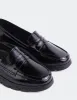 Harmani Black Patent sold by L'Intervalle