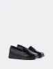 Harmani Black Patent sold by L'Intervalle