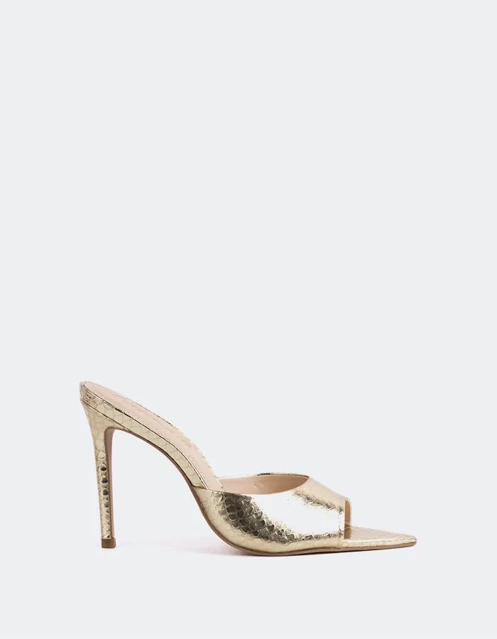 Thelma Gold Snake Leather sold by L'Intervalle