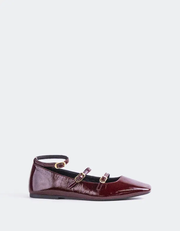 Glimmer Burgundy Patent sold by L'Intervalle