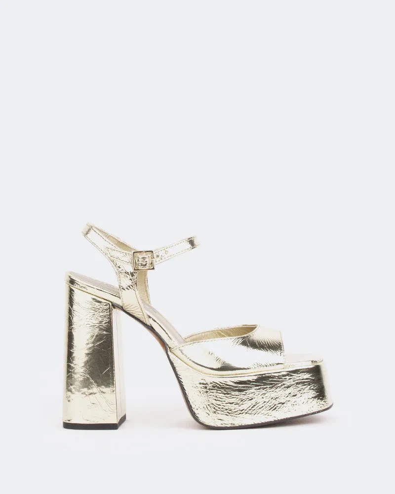 Times Gold Metal/Mètal Or sold by L'Intervalle