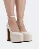 Boneca Off White Patent sold by L'Intervalle