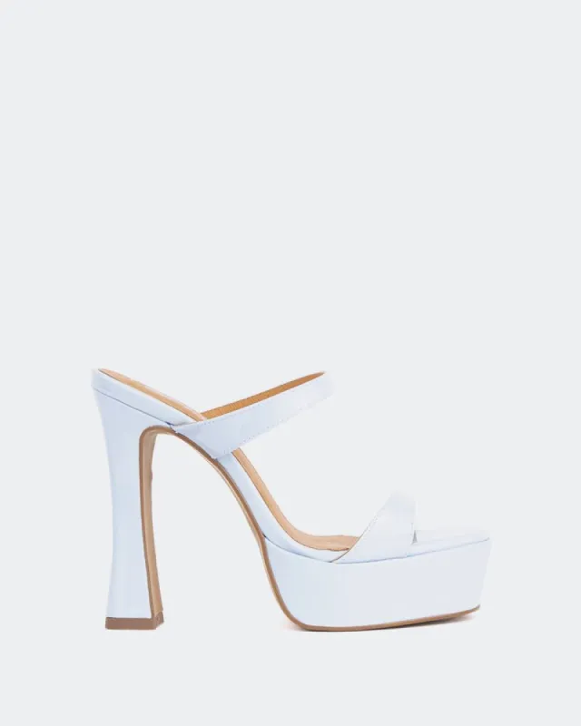 Vibes Blue Patent/Verni Bleu sold by L'Intervalle