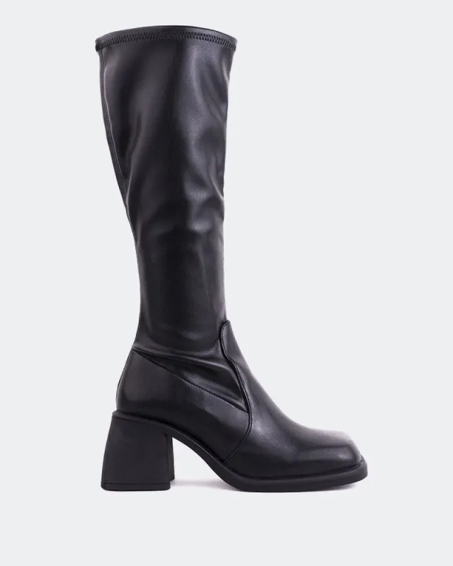 Arlo Black Stretch sold by L'Intervalle