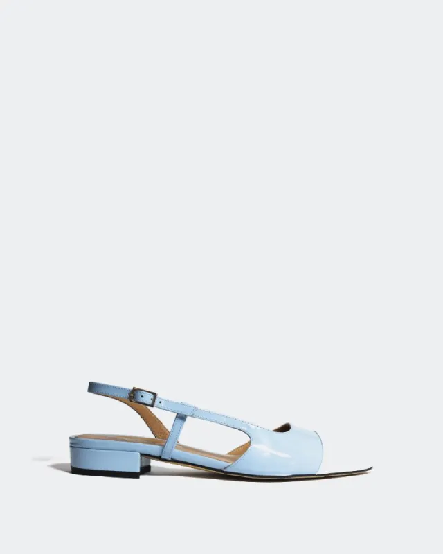Uda Light Blue Patent Leather sold by L'Intervalle