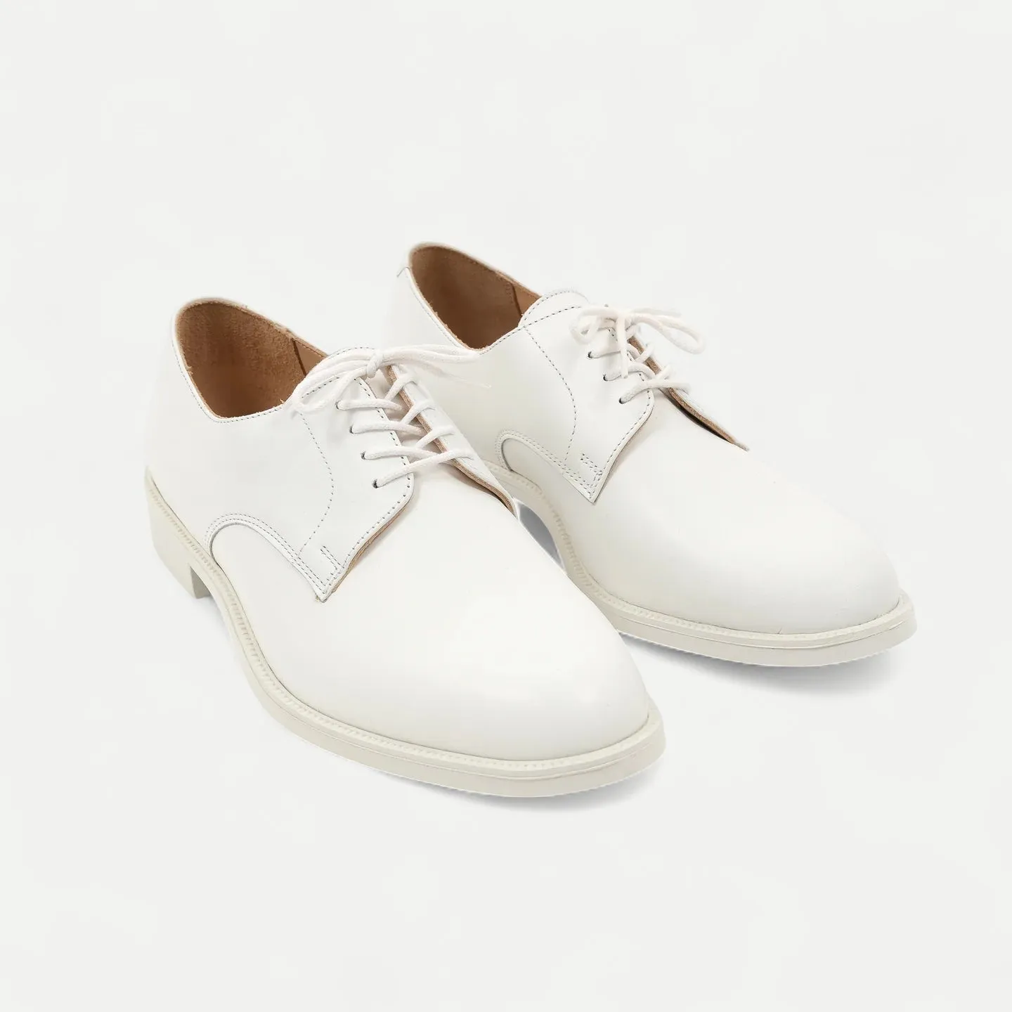 WHITE MARBOT SHOES sold by Universal Surplus