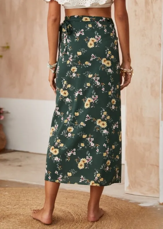 Green boho maxi skirt with floral print and side slit sold by Boho Mood