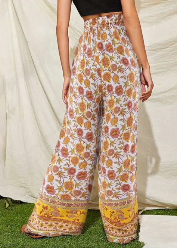 Boho flowing palazzo pants Orange hippie with pattern sold by Boho Mood