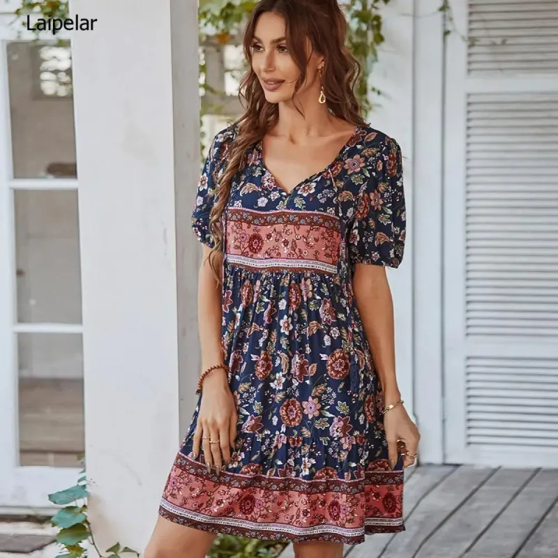 Gypsy mini dress in Dark Blue with Floral Print sold by Boho Mood