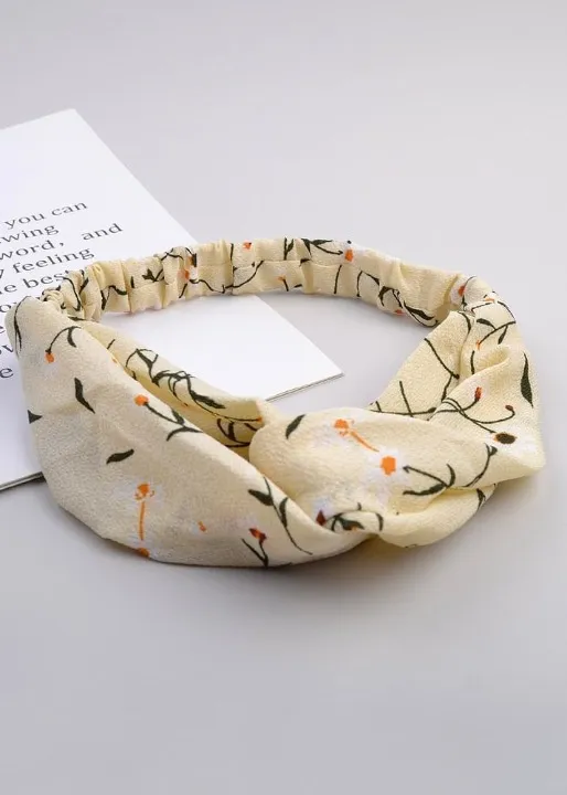 Boho cloth headband with natural colors and design sold by Boho Mood