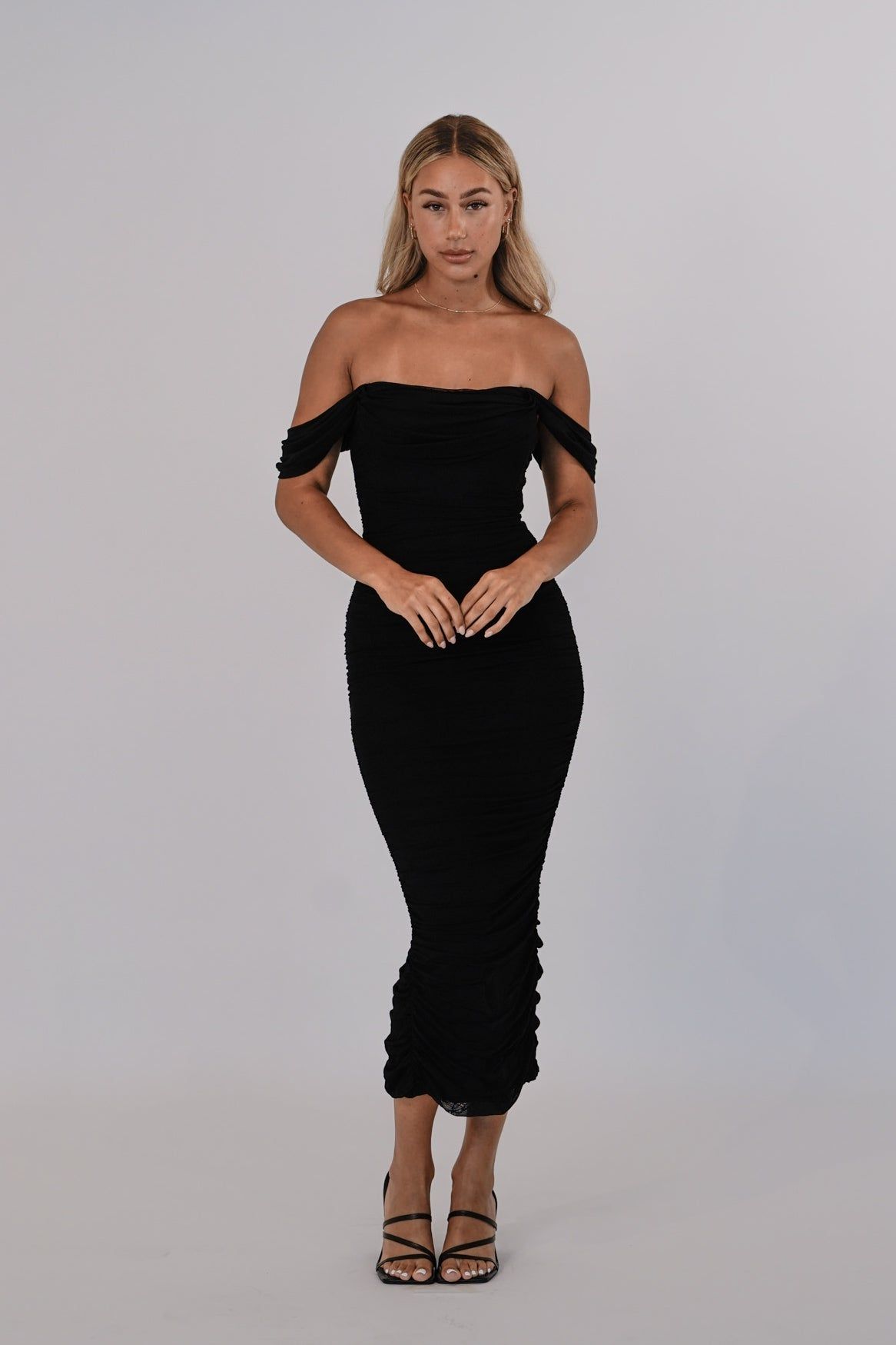 Regan Maxi Dress - Black sold by Kameli Boutique
