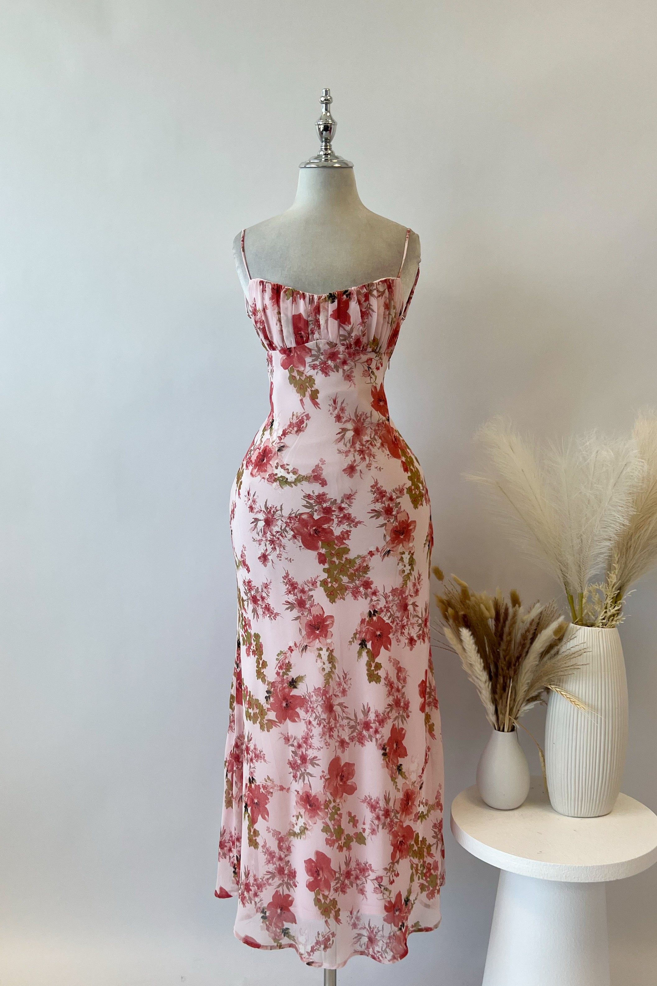 Kylie Floral Midi Dress sold by Kameli Boutique