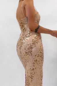 Tyla Midi Dress sold by Kameli Boutique