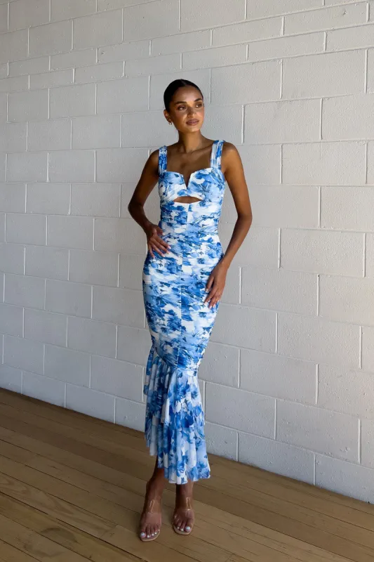 Melissa Floral Midi Dress sold by Kameli Boutique