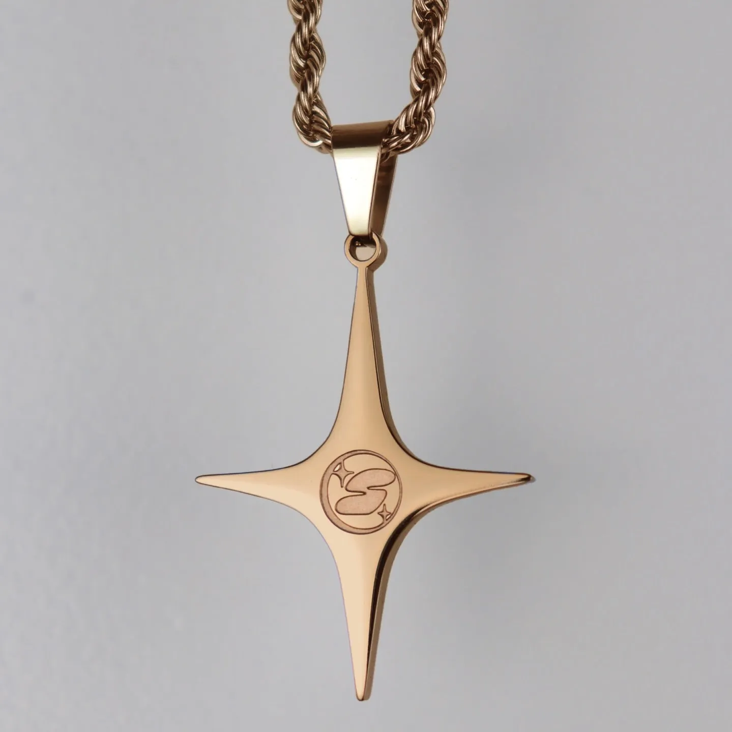 ROSE GOLD STAR PENDANT sold by STNR