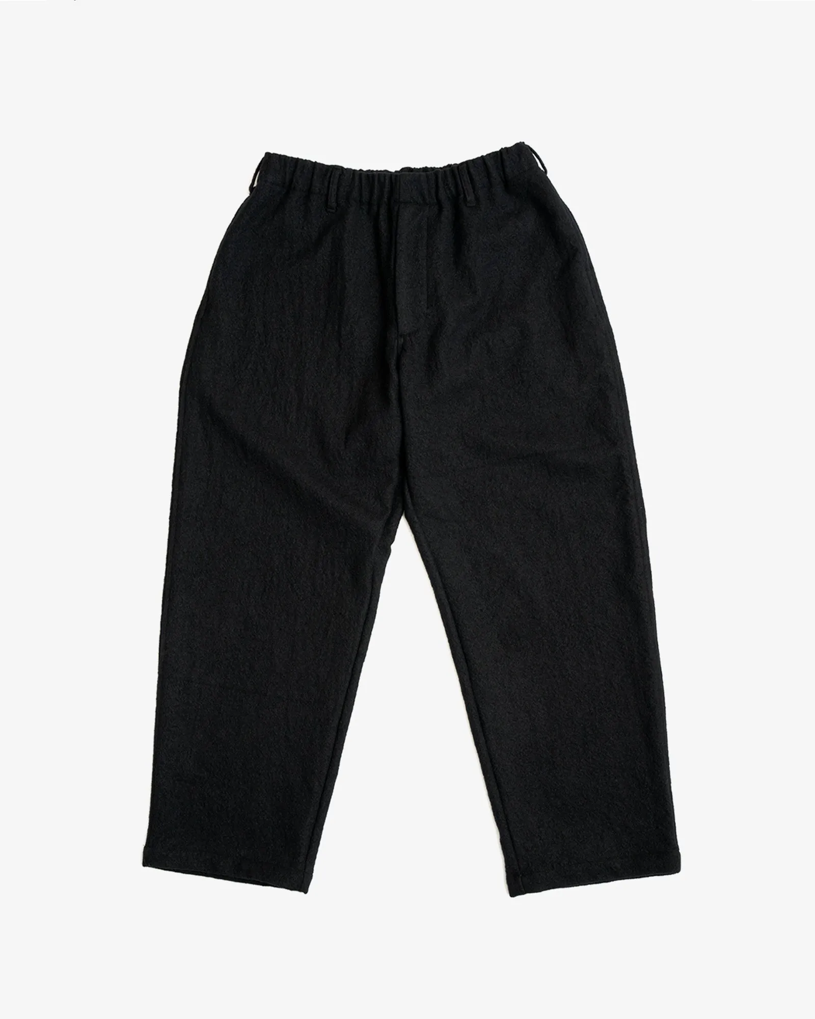 CARRY ON PANT - PIECE DYED BLACK WOOL FLANNEL sold by James Coward