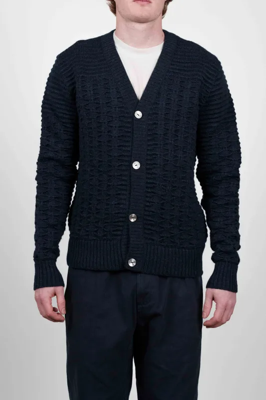 BINDING cardigan, all ocean blue sold by S.N.S HERNING