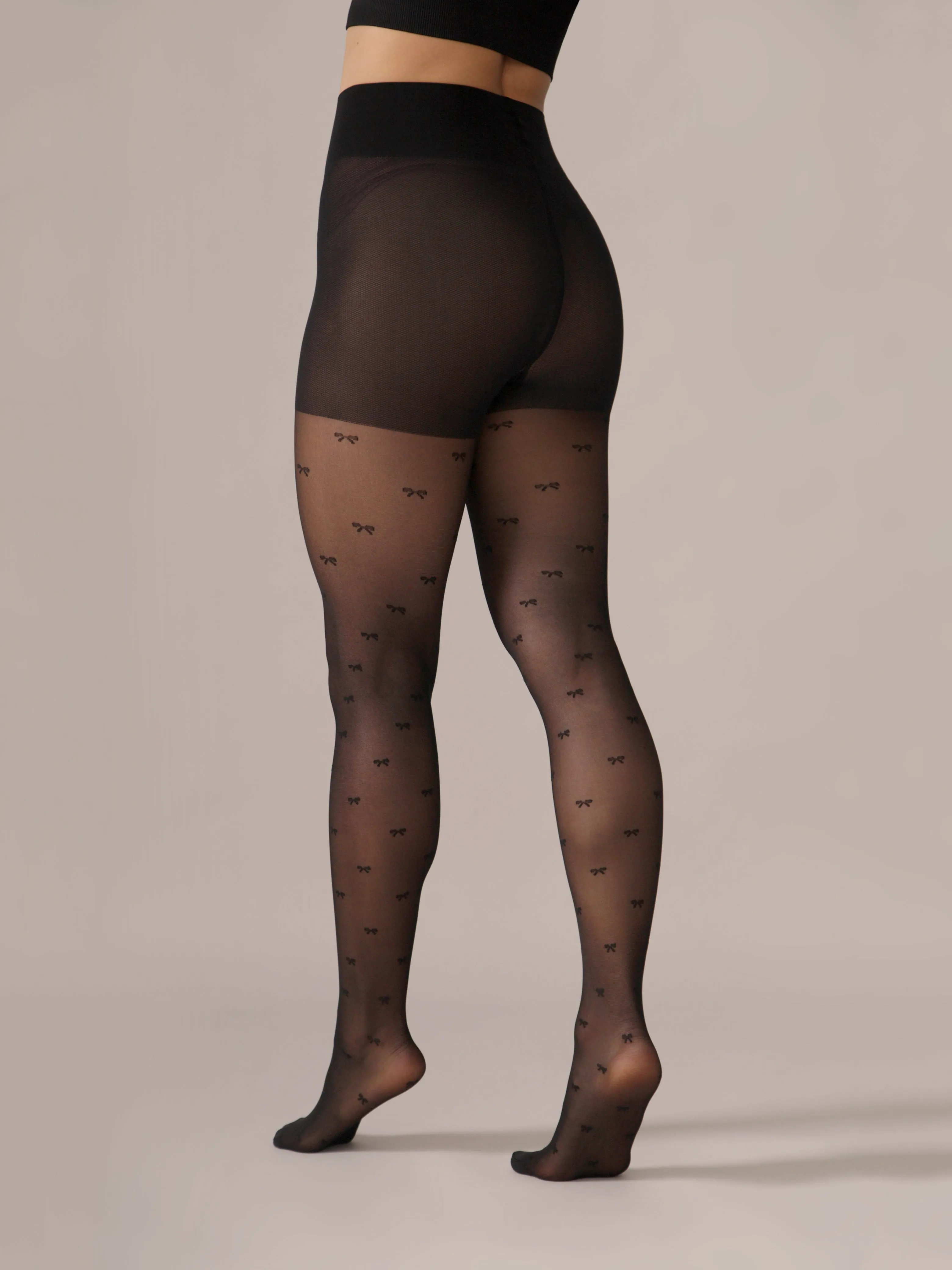 Micro Bow Pattern Smoothing Waistband Tights in Black sold by From Rachel product image thumbnail 5