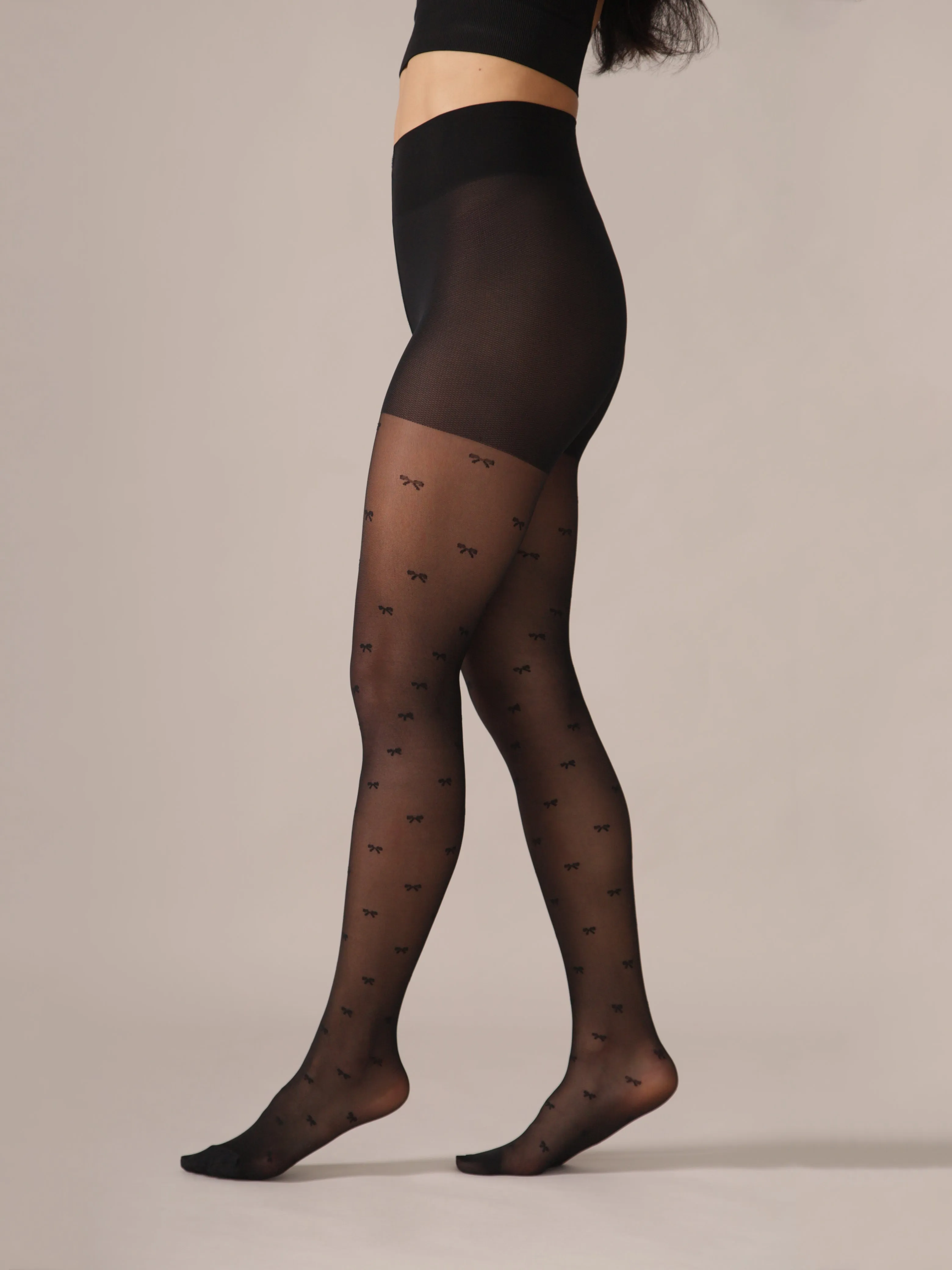 Micro Bow Pattern Smoothing Waistband Tights in Black sold by From Rachel product image thumbnail 4