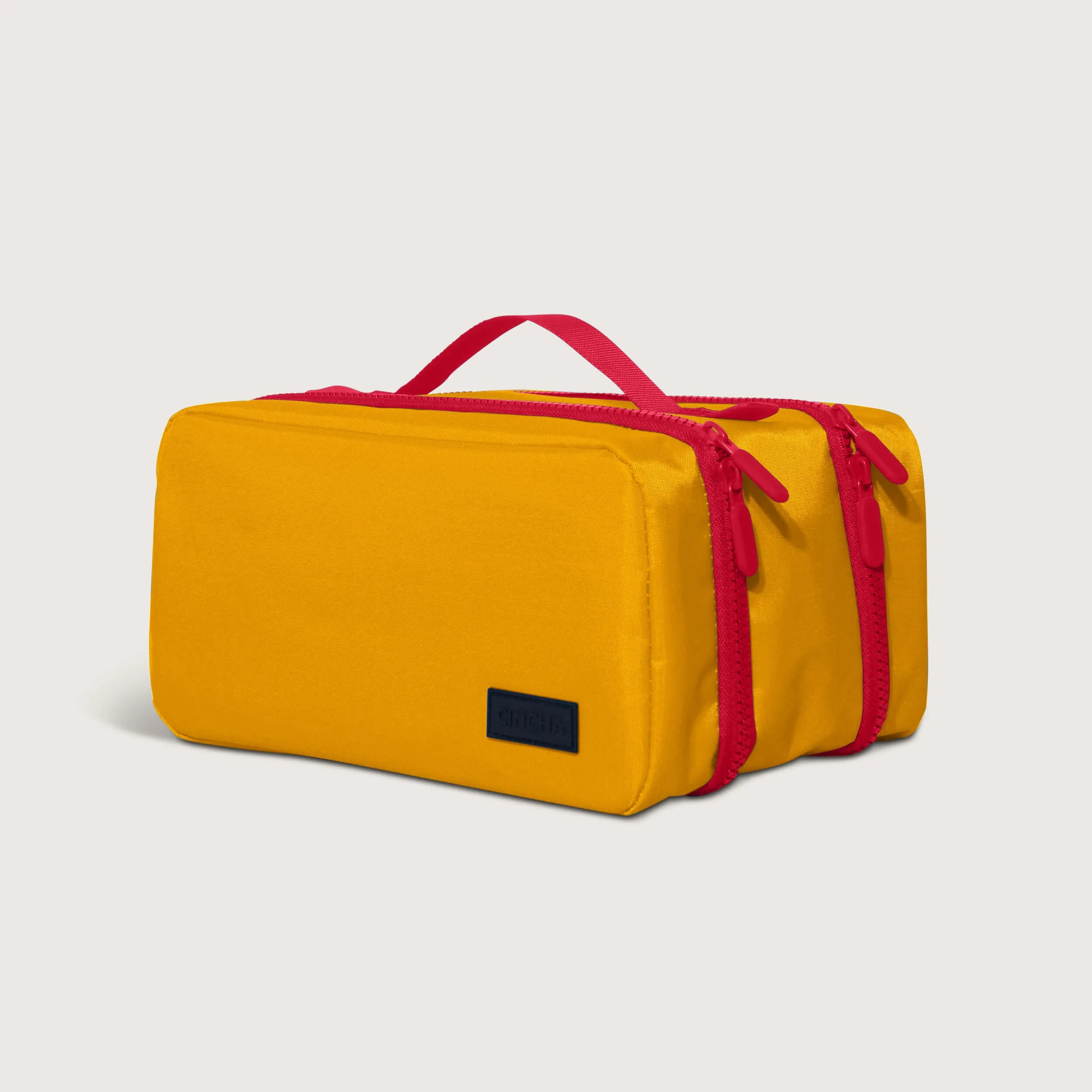 The Toiletry Bag - Marigold sold by Cincha Travel