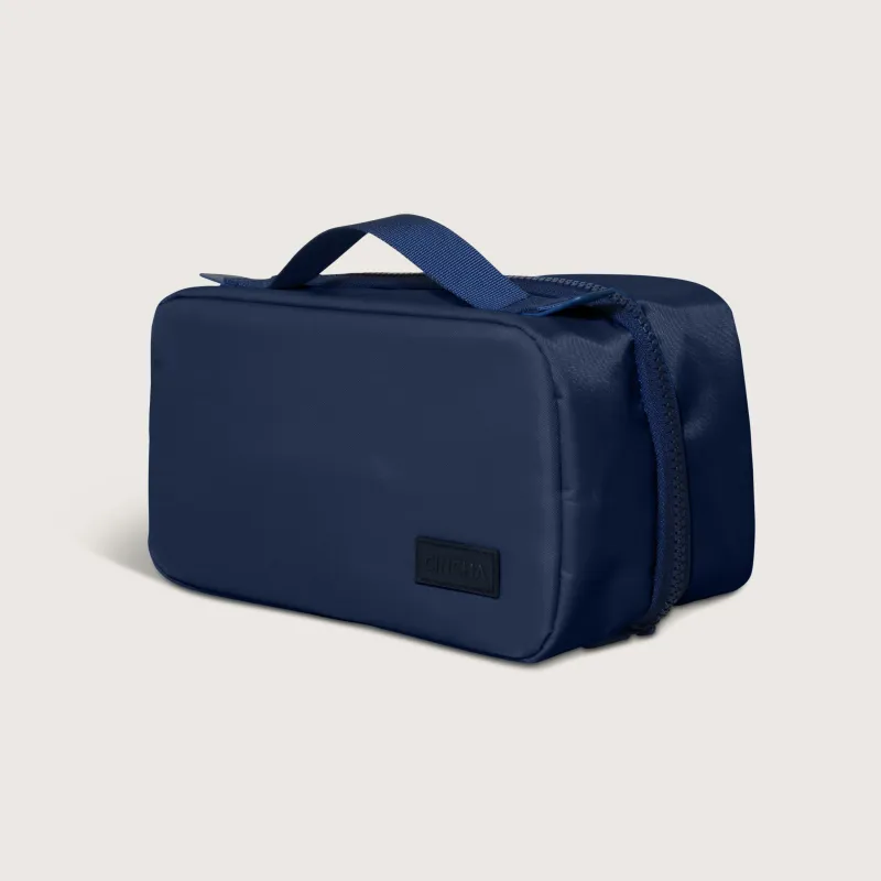 The Small Toiletry Bag - Navy sold by Cincha Travel