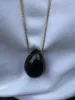 Lumi Necklace Obsidian Gold sold by Stellar Whispers